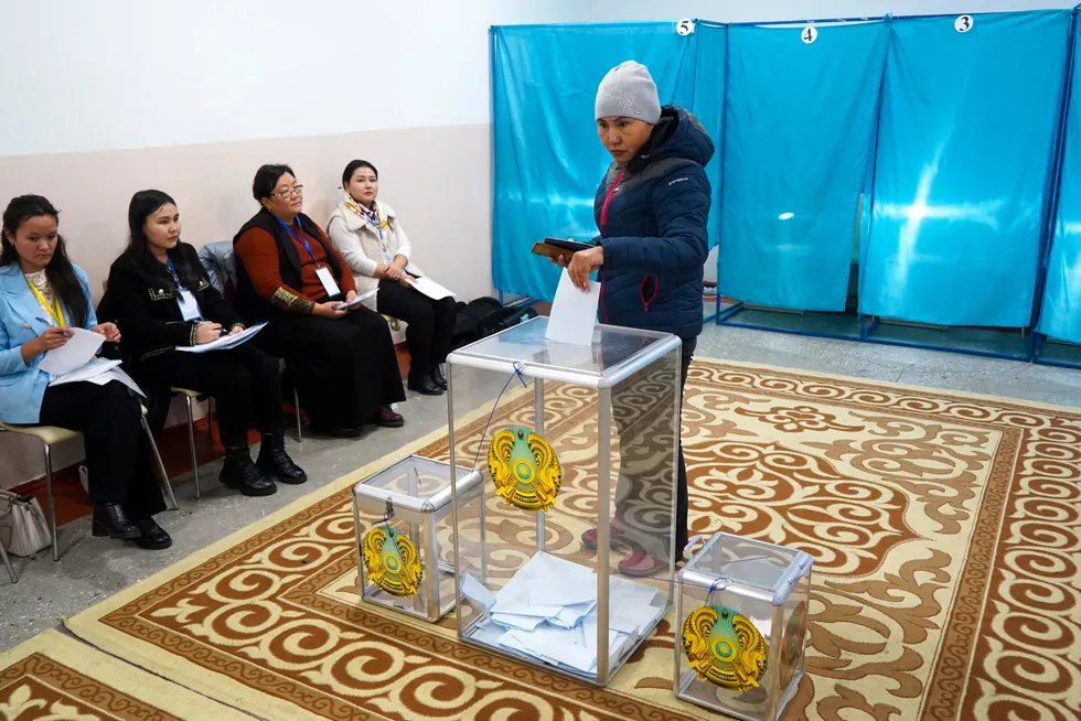 Choices: A woman casts a ballot at a polling station in Almaty, Kazakhstan, in the 20 November presidential election.
