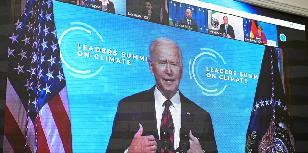 US President Joe Biden (on the screen) addresses the recent online Leaders Summit on Climate.