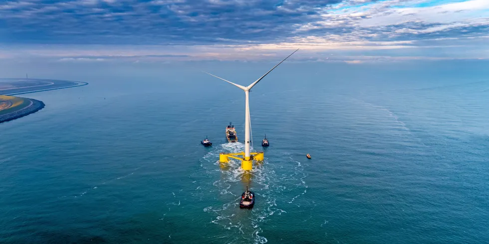 A Principle Power WindFloat floating wind unit being towed to the site of the ACS Cobra Kincardine project off Scotland in 2021