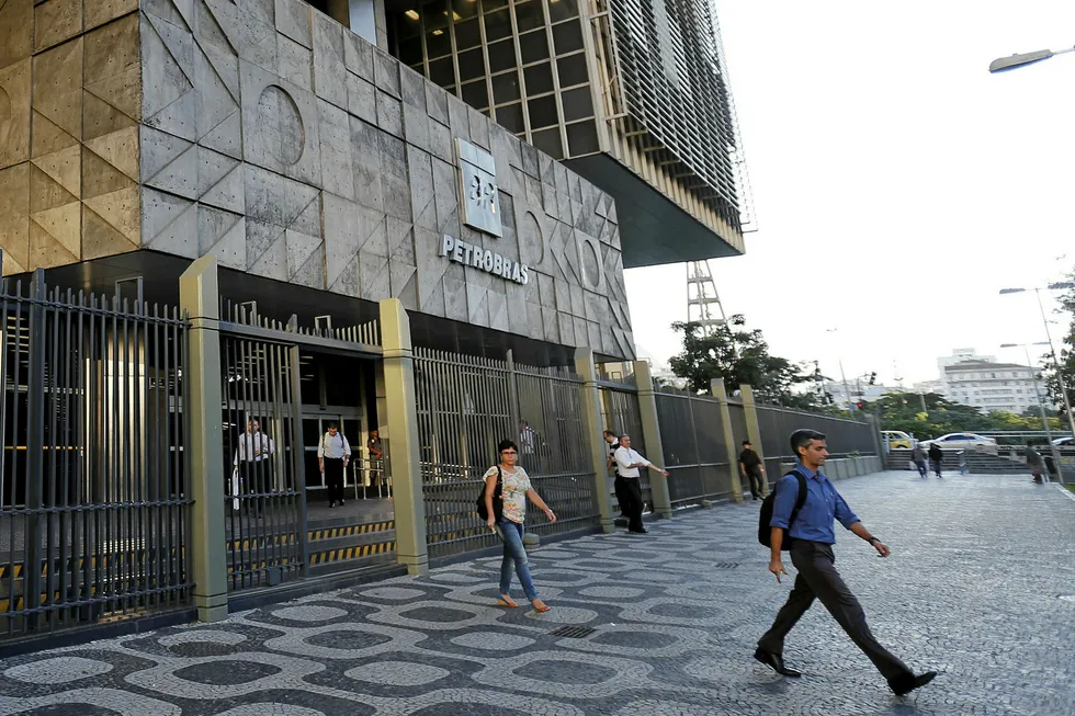 Extension: people leave the headquarters of Petrobras in Rio de Janeiro, Brazil