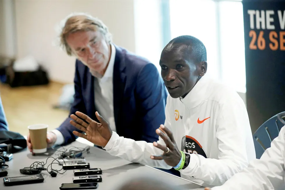 Eyes on the prize: Marathon world record holder Kenya's Eliud Kipchoge and Ineos chief executive Jim Ratcliffe take questions at the Iffley Road Track, where in 1954 British athlete Roger Bannister ran to become the first person ever to break the four minute mile barrier in Oxford, England, last week.