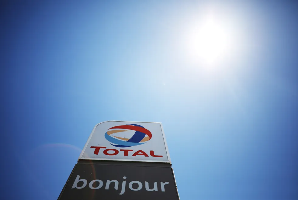 Talks: the logo of French oil and gas company Total is seen above a petrol station in Cape Town, South Africa