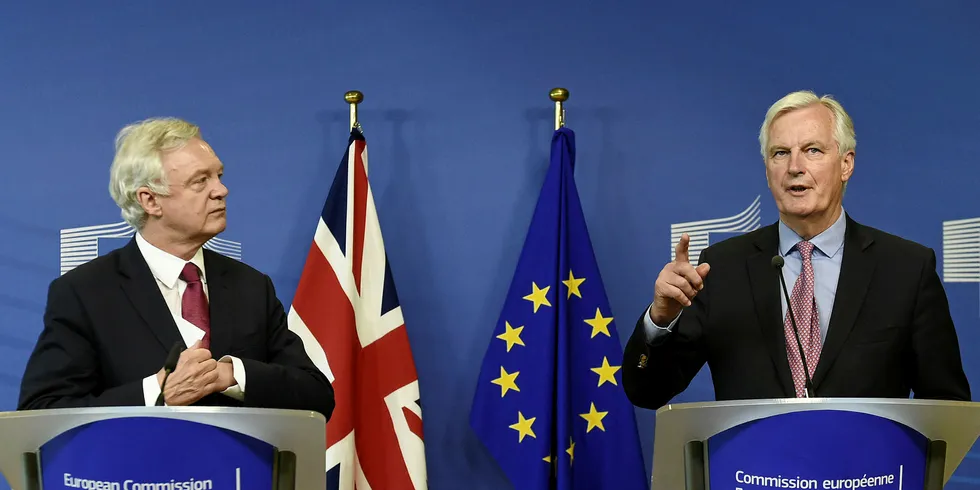 EU chief negotiator Michel Barnier (right) and UK Brexit minister David Davis start two years of negotiations. Pic: JOHN THYS/AFP/Getty Images