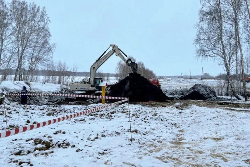 Heavy load: Remedial work at a site of oil pipeline spill near the village of Lugovaya in Russia’s Omsk region.