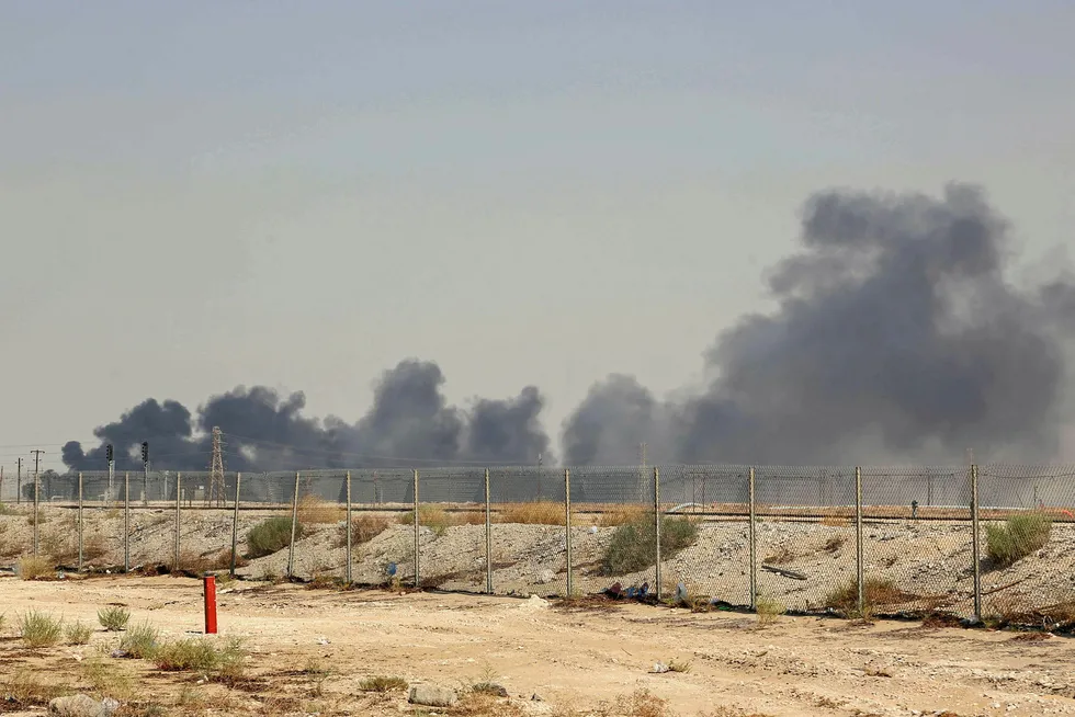 Strike: smoke billows from an Aramco oil facility in Abqaiq, south-west of Dhahran in Saudi Arabia. Yemen’s Iran-aligned Huthi rebels claimed the drone attacks