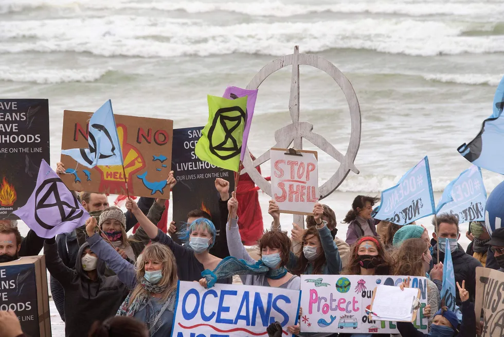 People at Muizenberg beach in Cape Town protesting in 2021 against Shell's plan to shoot seismic off the Wild Coast.