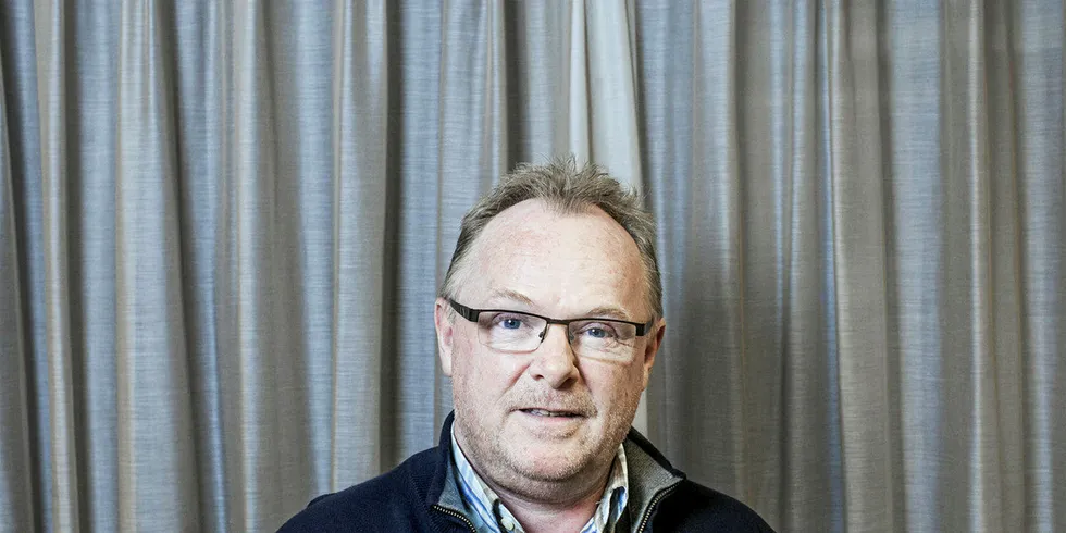 Fiskeriminister Per Sandberg ønsker ikke å innføre en ny avgift for oppdrettsnæringen, og mener en må la Havbruksfondet få tid til å virke først. (Foto: Adrian Nielsen)