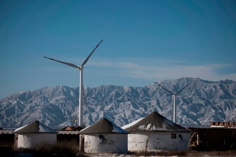 Cutting emissions: wind turbines in Guanting, outside Beijing