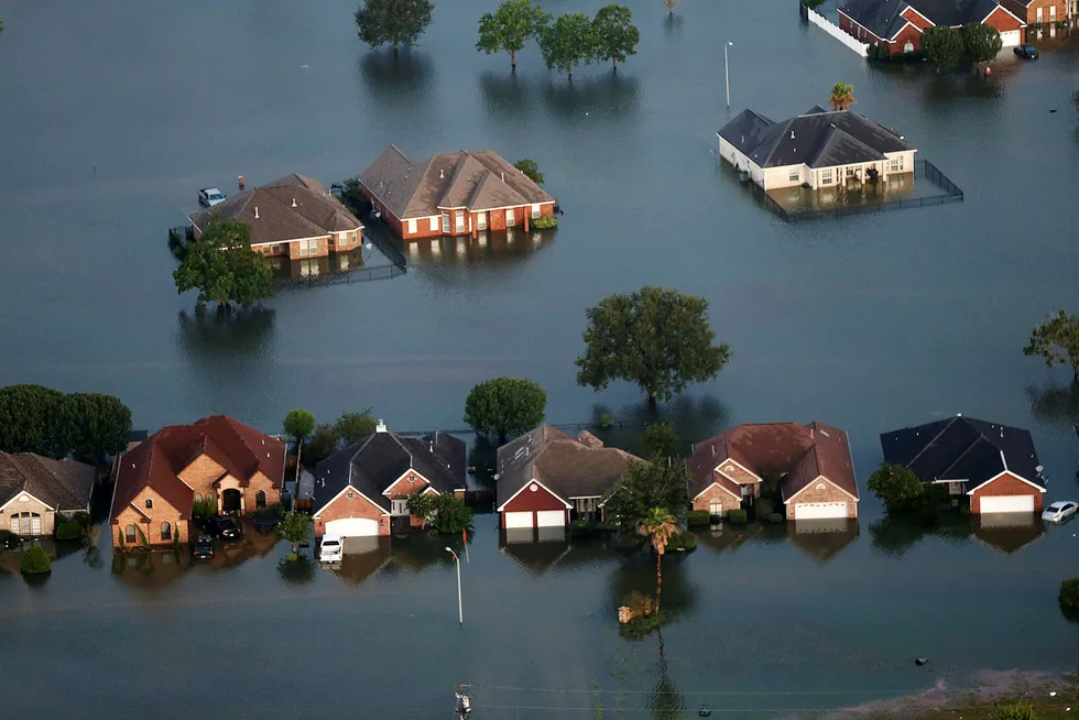 Regnet fra orkanen Harvey fikk Houston til å synke. Foto: Gerald Herbert/AP/NTB Scanpix