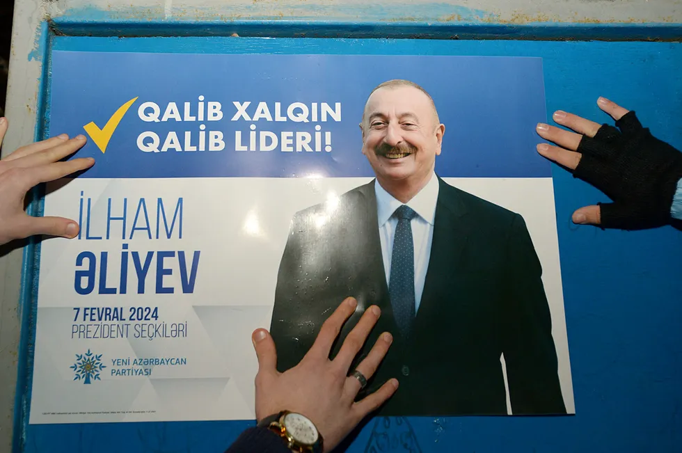 Reforms: A poster supporting Azerbaijani President Ilham Aliyev’s re-election camapign in Baku.