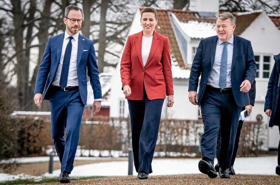 Danish Prime Minister and leader of the Social Democrats, Mette Frederiksen (centre), flanked by the then chairman of the Liberal Party, Jakob Ellemann-Jensen (left), and the Leader of the Moderates party, Lars Lokke Rasmussen (right), now minister of foreign affairs, in a picture taken in 2022.