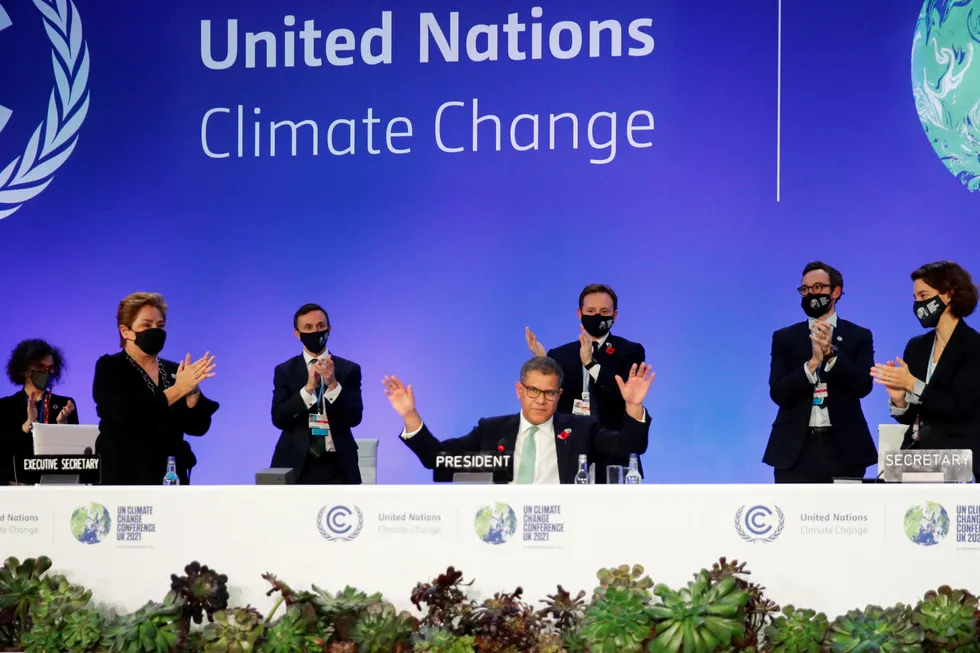 Applause: COP26 President Alok Sharma gestures as the UN Climate Change Conference reaches its conclusion on 13 November