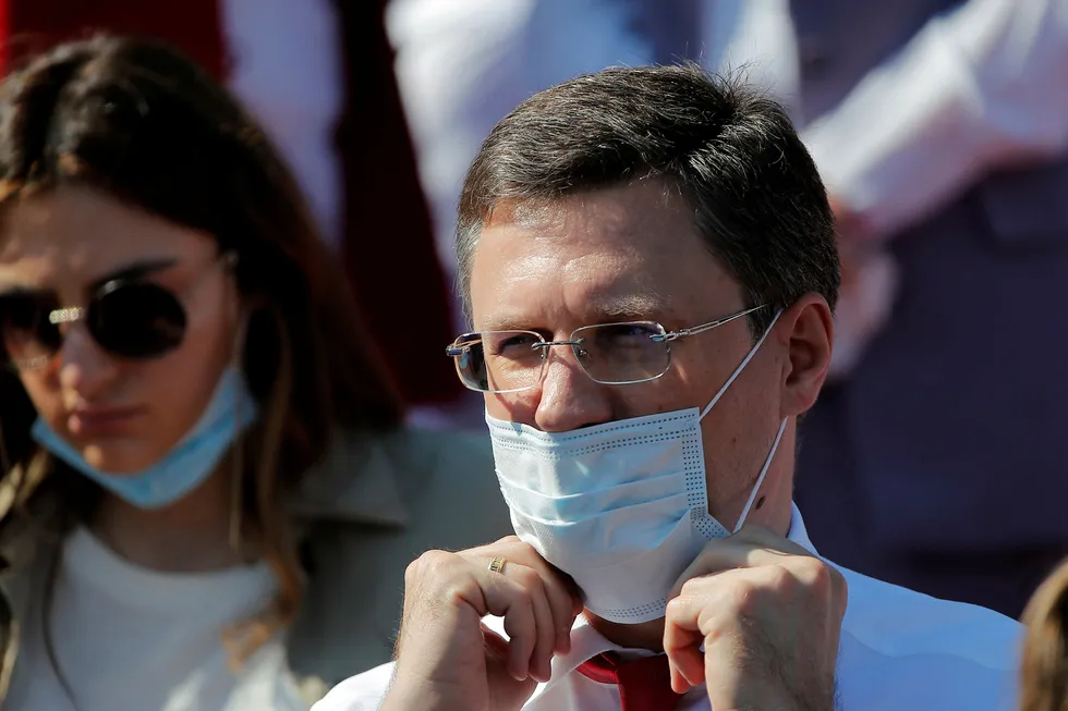 Concerns confirmed: Russian Energy Minister Alexander Novak puts a protective face mask while attending the Victory Day Parade in Red Square in Moscow, Russia on 24 June