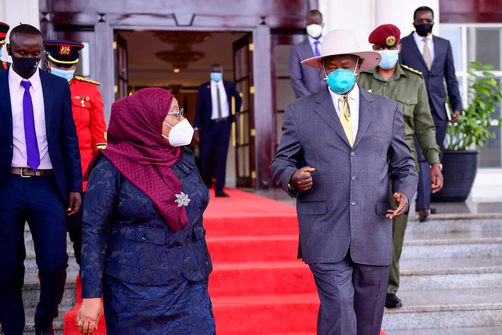 Key oil deals: Tanzania's President Samia Suluhu Hassan (left) and Uganda's President Yoweri Museveni
