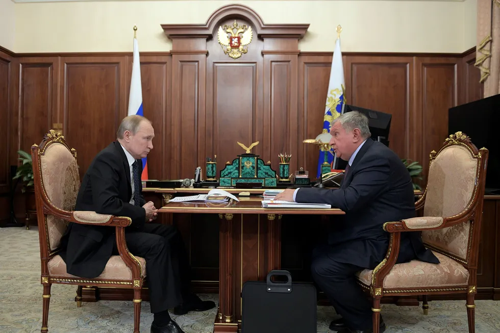 Promotion: Rosneft chief executive Igor Sechin delivers promises to Russian President Vladimir Putin at a recent meeting in Moscow