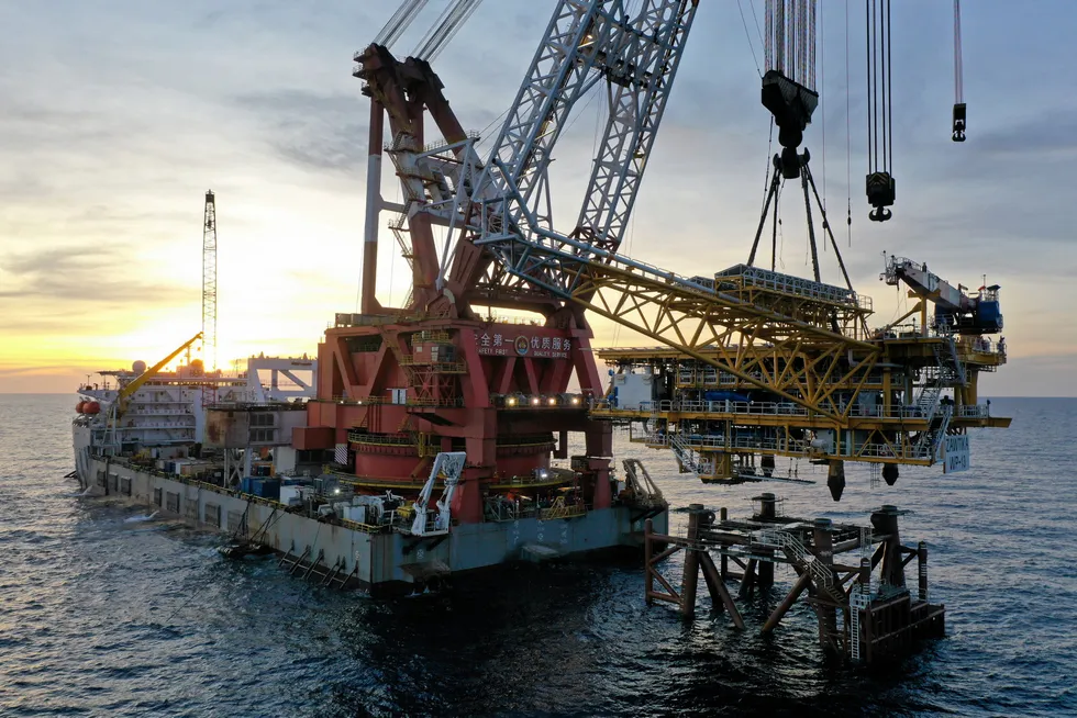 Heavy lift: Guangzhou Salvage installs a wellhead platform for PTTEP’s Zawtika 1D phase development offshore Myanmar.