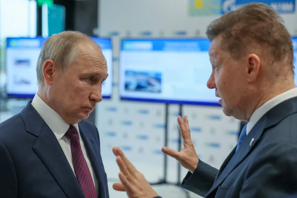 Russian President Vladimir Putin (left) and Gazprom executive chairman Alexei Miller.