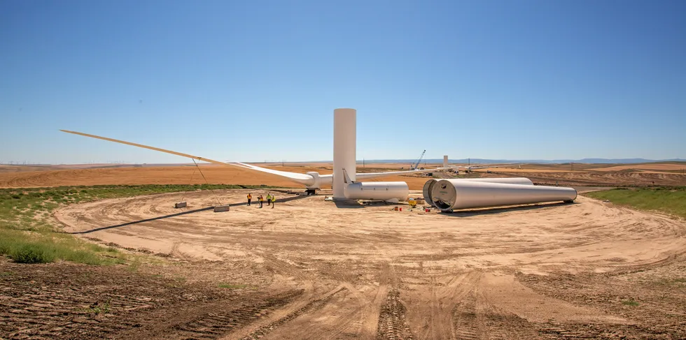 The tower and rotor are ready for assembly at the Tucannon Wind Farm during construction, July 2014. . Construction of Portland General Electric's Tucannon River wind farm in Washington state.