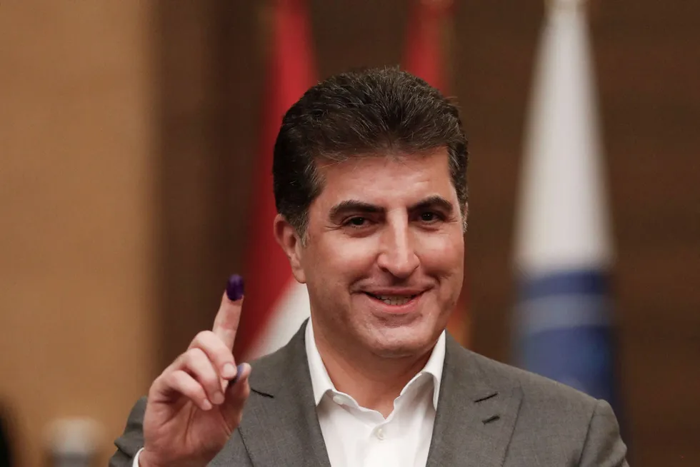 Reaction: Nechirvan Barzani, president of Iraq's autonomous Kurdistan Region shows his ink-stained finger after voting in parliamentary elections last year