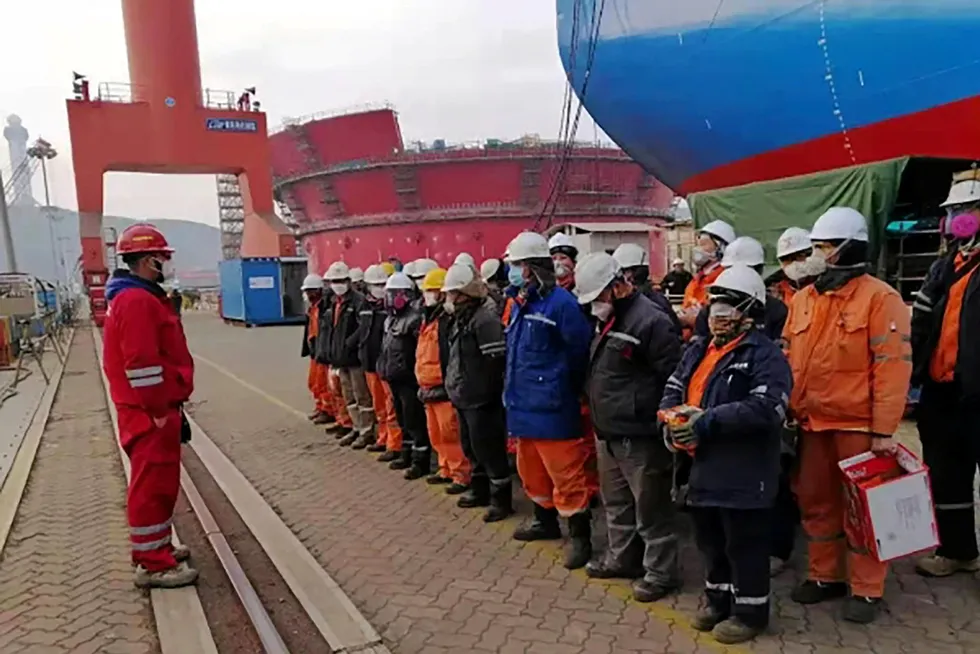 Training: workers last year receive precautionary tips for Covid-19 before starting their shift on Shell's Penguins FPSO at COOEC