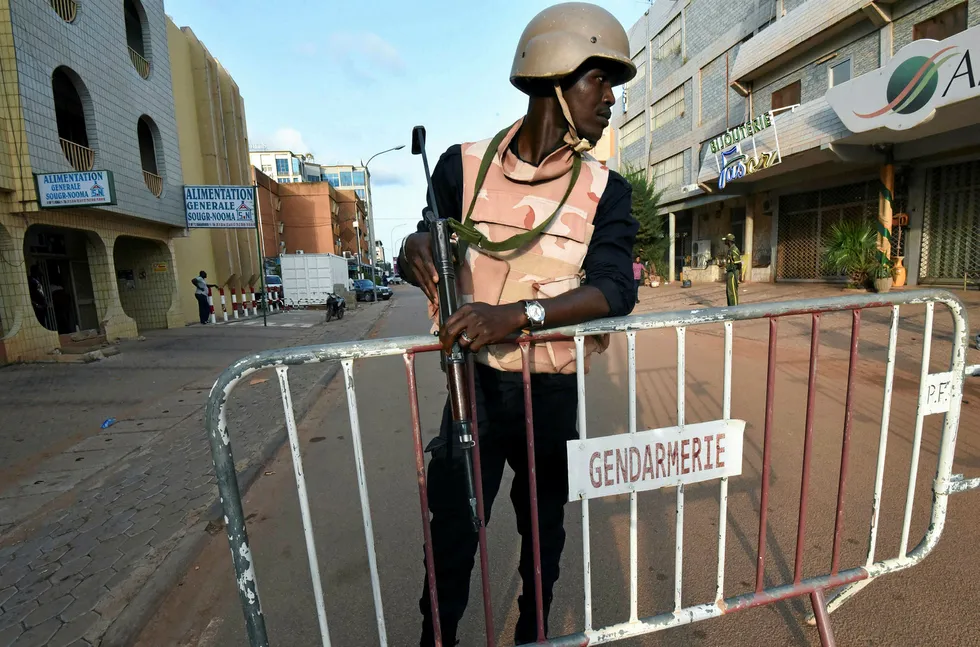 Aftermath: a member of the security at the scene of the terror attack in Ouagadougou