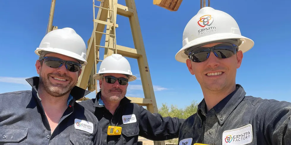 Zach Broussard, director of Cemvita spin-off Gold H2, right, and colleagues at the site of the field test.