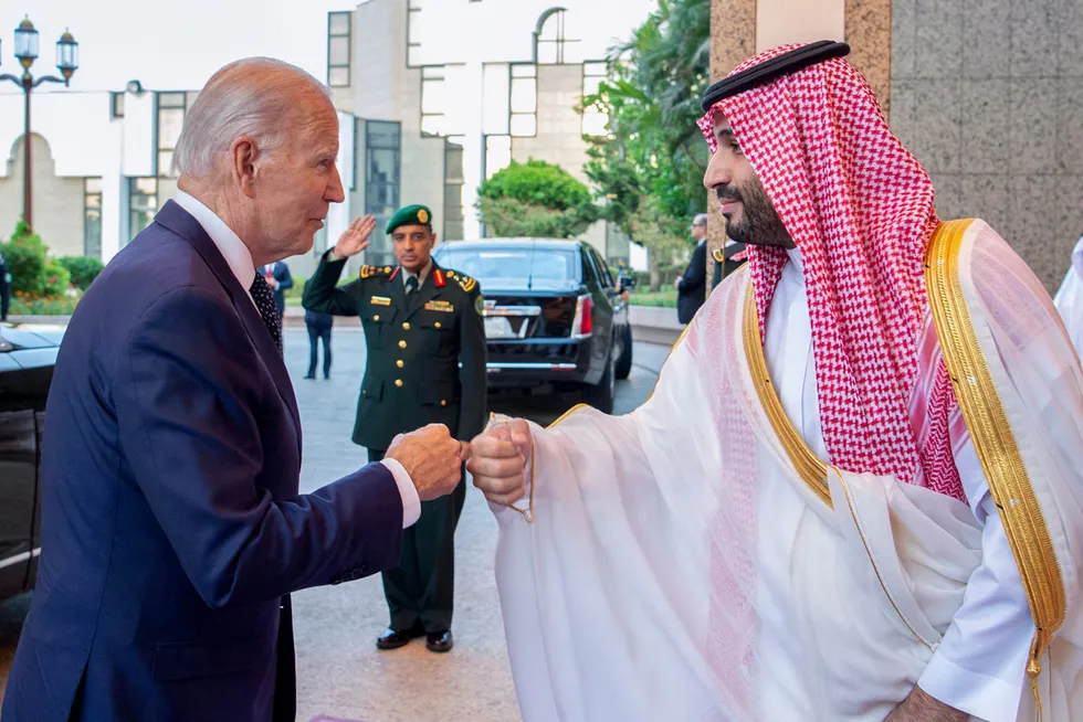 Welcome: Saudi Crown Prince Mohammed bin Salman (right) greets US President Joe Biden with a fist bump as the US leader arrived at Al-Salam palace in Jeddah 15 July