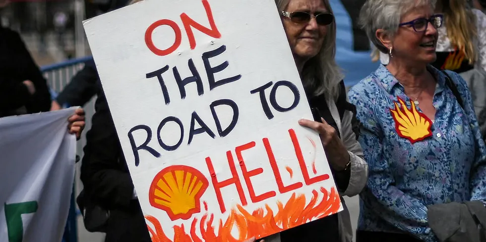 Protesters challenge Shell over its climate record.