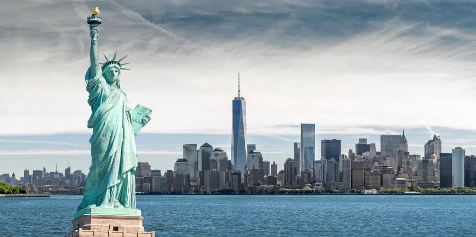 The Statue of Liberty with One World Trade Center background, Landmarks of New York City, USA . New York.