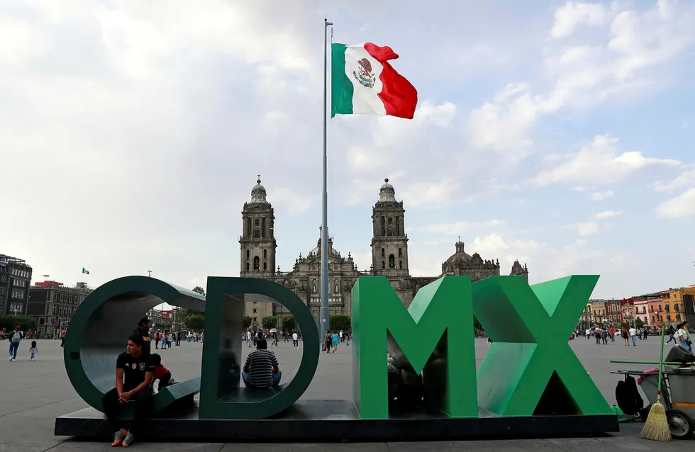 Suspended: the national flag flies above Zocalo Square in Mexico City as regulators take measures to help oil companies cope with the Covid-19 headwinds