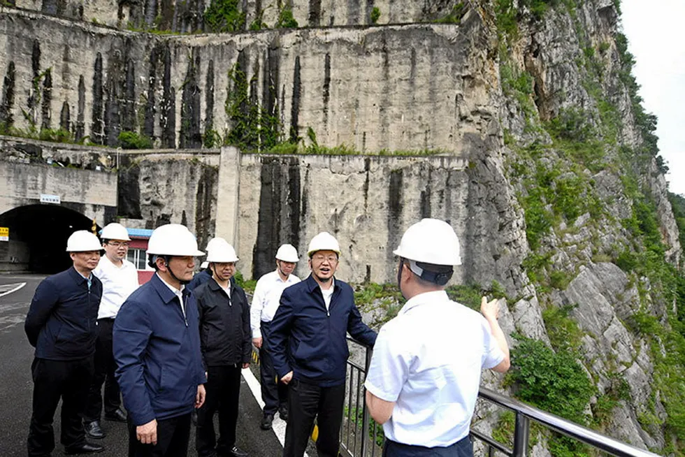 Zhang Jianhua, (second from right), the director of National Energy Administration, makes an energy inspection tour in Guizhou province, China