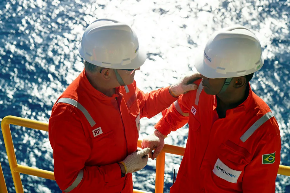 More production: PetroRio workers on board the Polvo FPSO