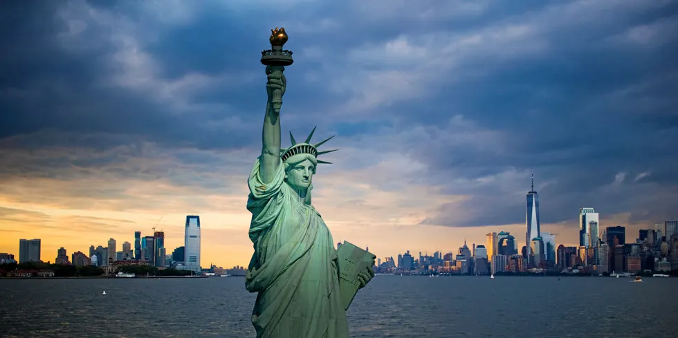 The Statue of Liberty with a view of both New York and New Jersey.