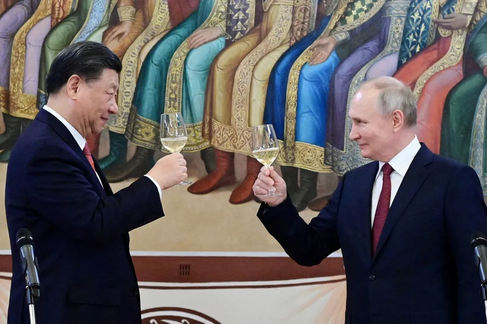 Russian President Vladimir Putin (right) and Chinese President Xi Jinping attend a reception at the Kremlin in Moscow, earlier this month.