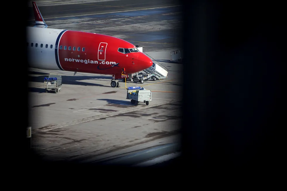 Et Norwegian-fly på Oslo Lufthavn. Det var ombord på et Norwegian-fly på flyplassen Gatwick at krangelen mellom passasjeren og flypersonalet skal ha oppstått. Foto: Javad Parsa