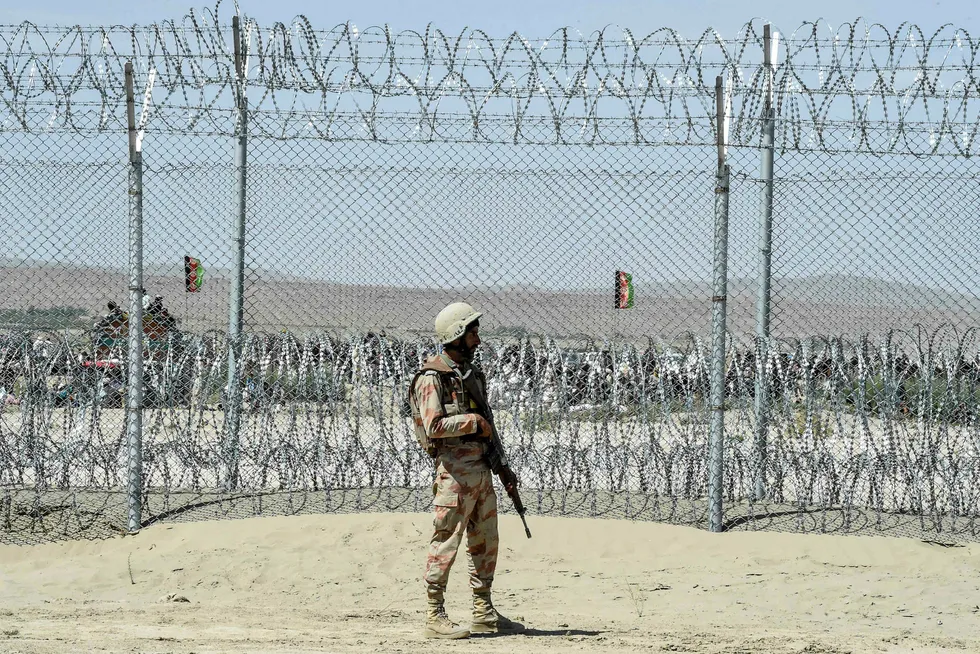 Protection: a member of Pakistan's Frontier Corps stands guard at a newly inaugurated border crossing between Pakistan and Afghanistan in Balochistan province