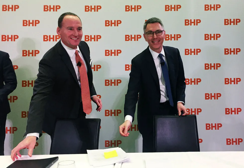 Trion chase: BHP chief executive Mike Henry (right)