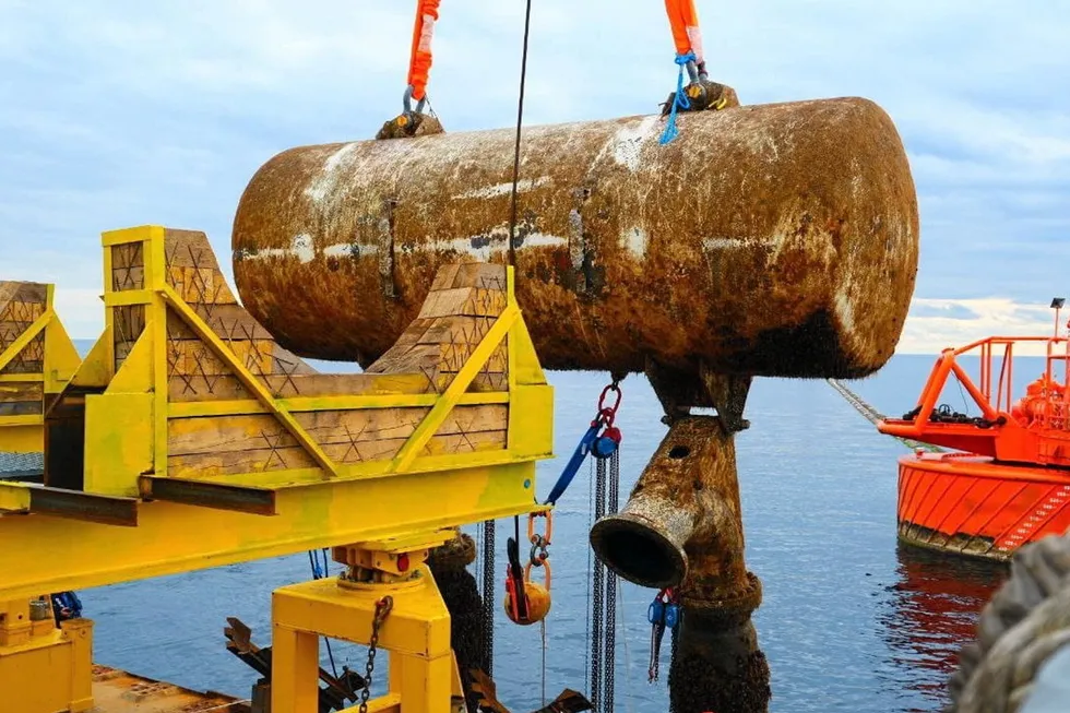 Rising hope: A damaged buoyancy tank being lifted from the sea next to an offshore tanker loading buoy, operated by Caspian Pipeline Consortium near the Russian Black Sea port of Novorossiysk.