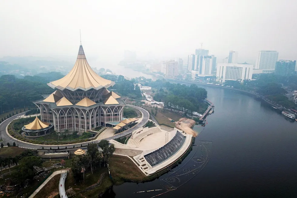 Government agreement: ariel view around the Sarawak Legislative Assembly building (L) in Kuching, the capital city of Sarawak state
