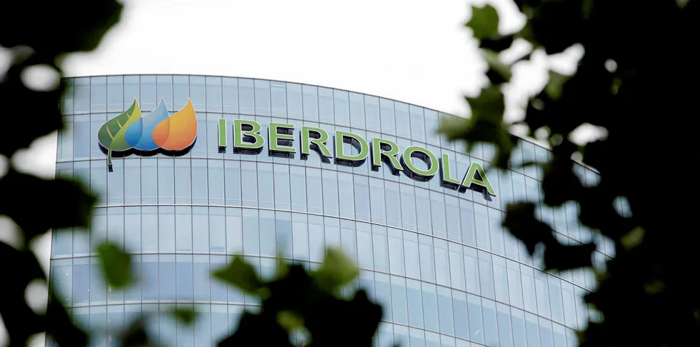 The logo of Iberdrola sits on display outside the headquarters of the company in Bilbao, Spain.