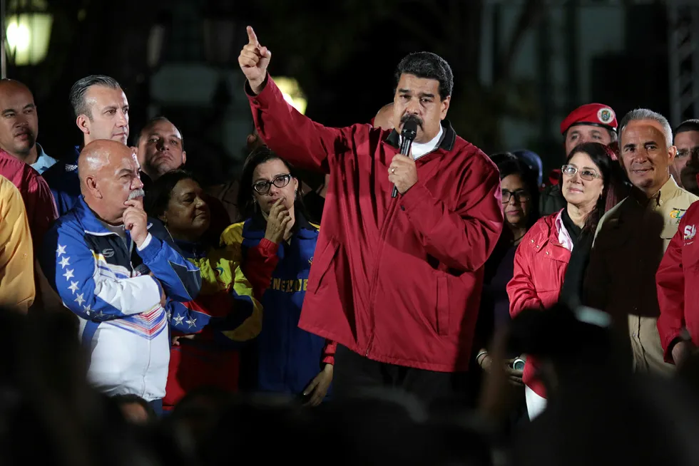 Venezuelas omstridte president Nicolas Maduro får det glatte lag av valgobservatører. Foto: Miraflores Palace/Handout via REUTERS