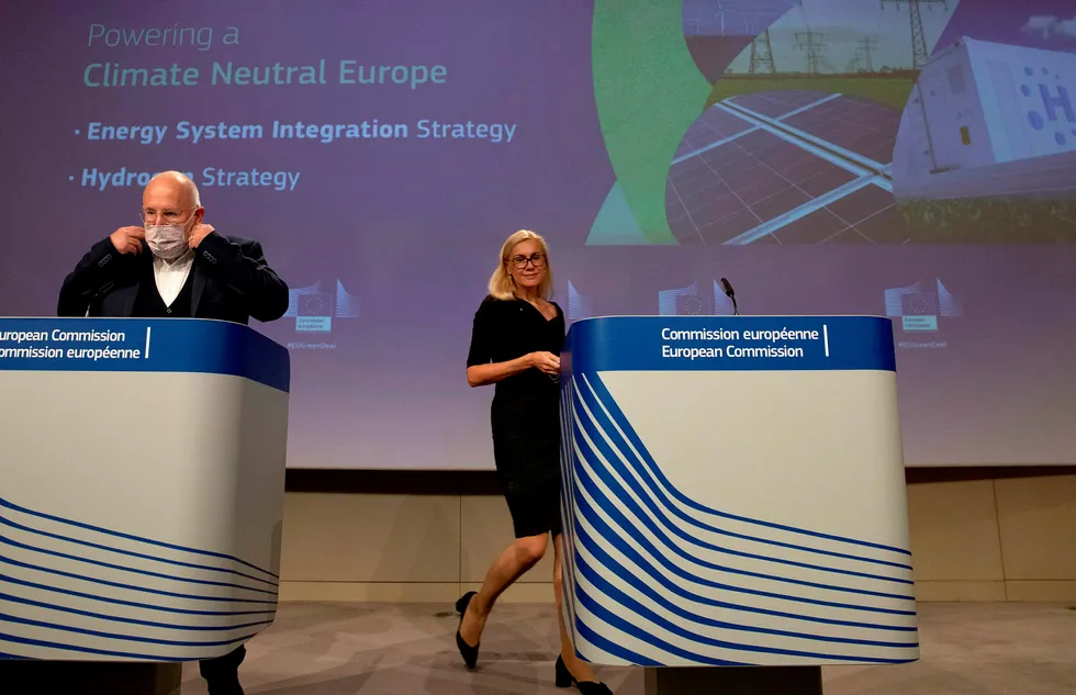 Hydrogen plan: European Commission vice-president in charge for European green deal Frans Timmermans (L), wearing a face mask, and EU commissioner for Energy Kadri Simson arrive to present a clean hydrogen strategy for Europe on 8 July 2020.