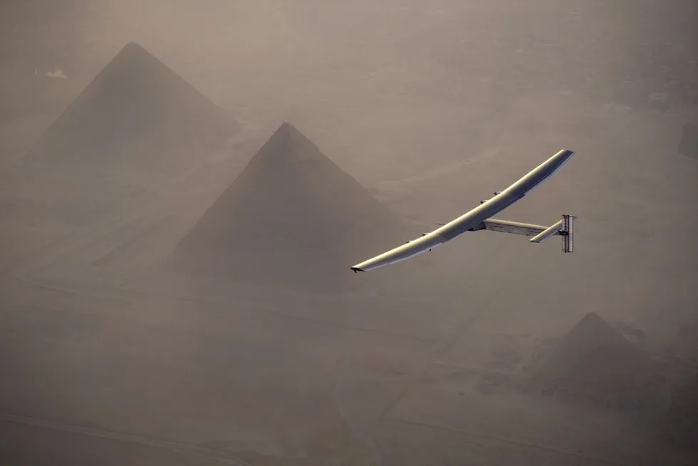 Solar potential: a solar-powered plane, piloted by Swiss pioneer Andre Borschberg, is seen during the flyover of the pyramids of Giza in 2016 before landing in Cairo, Egypt. Eni and Egyptian state-owned players will investigate producing hydrogen from solar energy