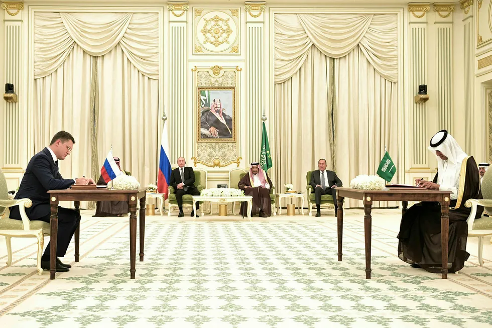 Accord: Russian President Vladimir Putin and Saudi Arabia's King Salman watch as Saudi Energy Minister Abdulaziz Bin Salman and Russian Energy Minister Alexander Novak attend a signing ceremony in Riyadh