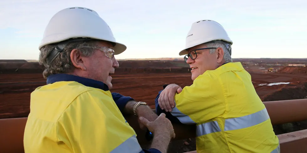 Australian Prime Minister Scott Morrison tours Fortescue Metals Group's mining operations with Fortescue Metals Group CEO Andrew Forrest (left).