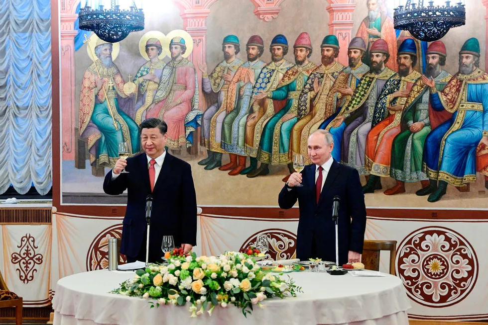 Closer cooperation: Russian President Vladimir Putin (right) and Chinese President Xi Jinping toast during dinner at The Palace of the Facets in the Moscow on 21 March 2023.