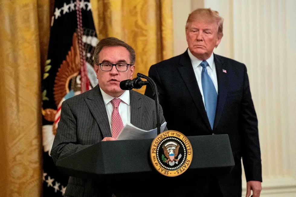 In the spotlight: US President Donald Trump (right) listens as EPA administrator Andrew Wheeler speaks at the White House earlier this year