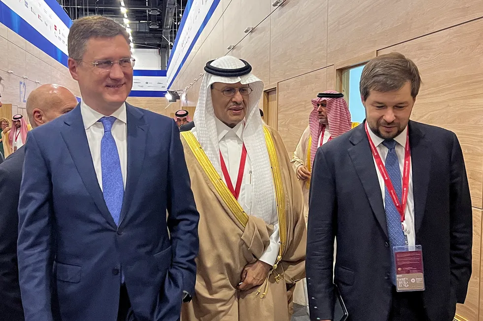 Russian treat: Russia's deputy prime minister Alexander Novak (left) and country's deputy energy minister Pavel Sorokin (right) walk with Saudi Arabia's energy minister Prince Abdulaziz bin Salman (centre).