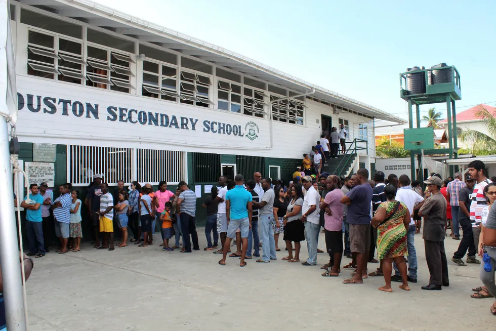 In line: Guyanese citizens waiting to vote in general elections held on 2 March