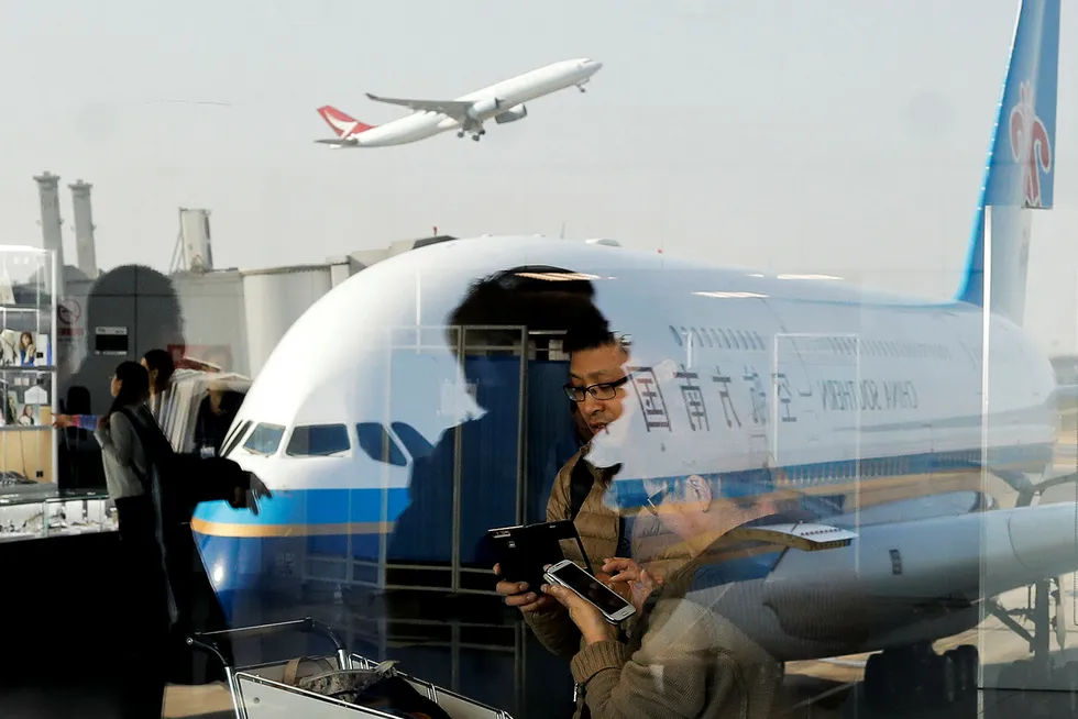 Det siste året er det lansert 35 prosent flere internasjonale ruter fra Kina. Kinesiske selskaper flyr direkte fra mellomstore byer til USA og Europa og konkurrerer på pris. Foto: Andy Wong/AP/NTB Scanpix